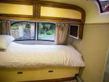 The bedroom also has luxury written all over it, with shiny new tech like a Samsung smart TV – unusual in any motorhomes for sale, especially a classic!