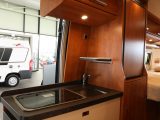 The panel van conversions have compact kitchens, but the materials used are very high quality