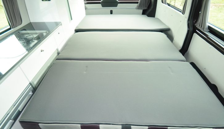 Two can sleep downstairs and two more in the integrated roof bed – read more in the Practical Motorhome CMC Reimo Trio High Style review