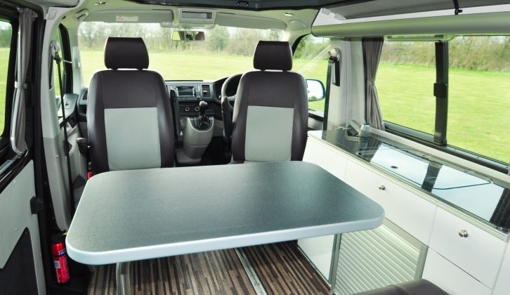 High-gloss acrylic fronts and black granite-effect tops on the furniture help make the CMC Reimo Trio High Style as much of a head-turner inside
as it is outside