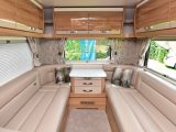 Optional Winchester Stone leather upholstery is seen in the large rear lounge of the overcab 649
