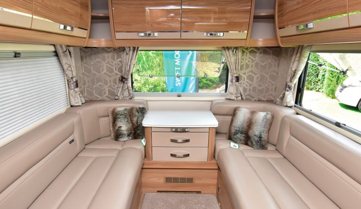 Optional Winchester Stone leather upholstery is seen in the large rear lounge of the overcab 649