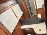 Surprisingly there is no window in the toilet room, but it's great when it comes to storage – check out the hanging fabric pockets