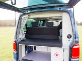 Lift the VW campervan's tailgate and you’ll see the filler for the freshwater tank, an easy-access gas locker, a large loading bay for luggage, and space for a portable toilet