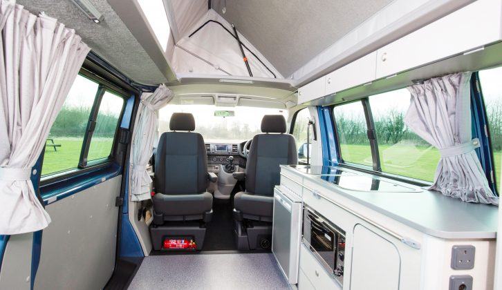 There's a great amount of worktop space and the side-hinged roof is cinch to lift – discover more in Practical Motorhome's Bilbo's Celex LWB review