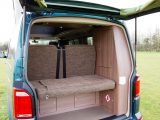 Raise the Birchover's tailgate to access a shower socket or to change the gas cylinder – two locker doors allow access beneath the seat bench, and there is even space for luggage