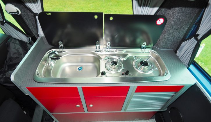 You get the standard-issue hob-and-sink combination in a sturdy,
unitary stainless-steel unit with separate lids for each part