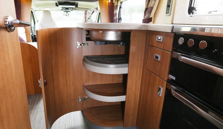 The space vacated by the fridge that permitted the insertion of the L-shaped kitchen unit means the addition of handy storage options under the worktop