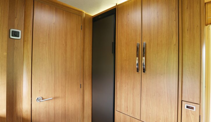 The fridge is on the nearside, next to the wardrobe, and is an on-trend ‘skinny’ unit, with bottle storage at the bottom