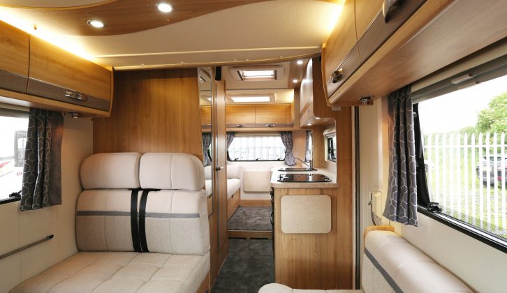 This is a proper family motorhome with two lounges and a travel seat for every berth