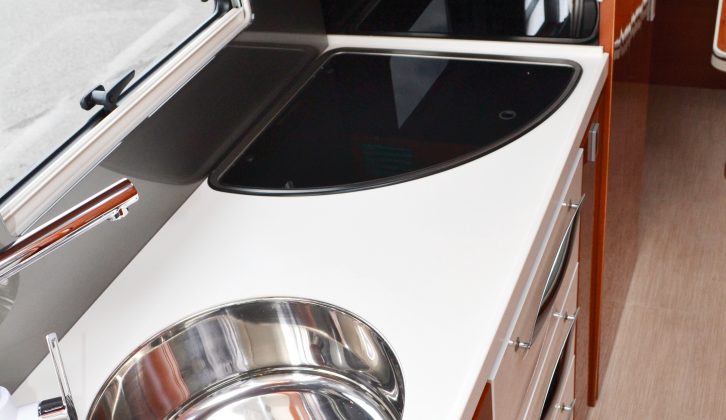 The kitchen worktop is quite generous and includes a sink cover that doubles up as a small shelf – albeit a flimsy one