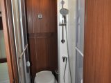 The nearside washroom has a sophisticated shower, while extra space has been created by positioning the basin outside the washroom itself