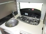 The sink isn't that wide, however the extension flap at least provides additional food preparation space