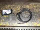 An endoscope camera, a mobile phone and a flue brush were ideal for inspecting and cleaning the issue