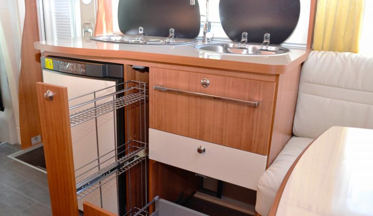A pull-out shelf in the Eura Mobil's kitchen is ideal for cans and other items you don’t want
to roll around, and there’s a cutlery drawer, too