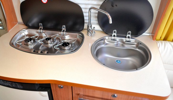 There's just a three-burner hob, however extra workspace has been created by moving the sink and hob back
