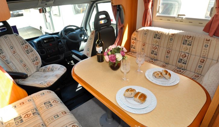 You get a short lounge but a long table in the Benimar, which has two travel seats