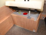 A helpful strut is included here to hold the seat base up, making accessing the water tank much easier than in many other van conversions – we like this attention to detail