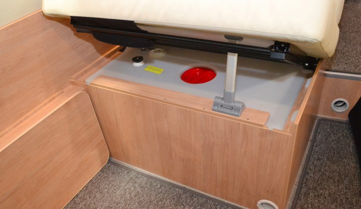 A helpful strut is included here to hold the seat base up, making accessing the water tank much easier than in many other van conversions – we like this attention to detail