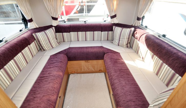 The massive lounge in this Auto-Trail is well lit, thanks to a Midi-Heki, and has plenty of storage options above and below