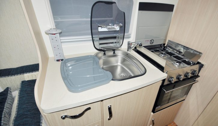 Between the lounge and the washroom there’s a galley kitchen with as much kit and space as you’d struggle to find in many a coachbuilt – impressive!
