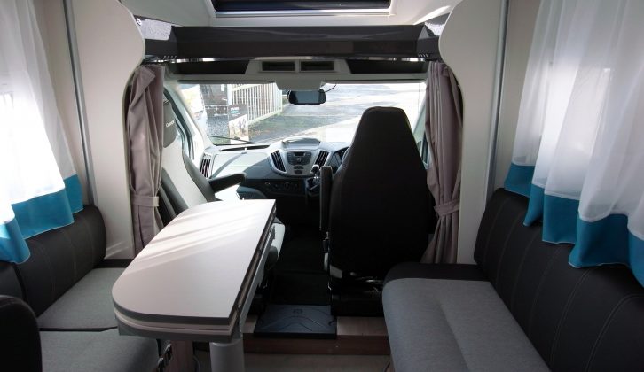 L-shaped seating with a second sofa opposite means there's lots of space, while folding the table in half permits easy access up and down the ’van