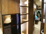 The wardrobe in this motorhome also benefits from a refined lighting solution, while a full-length mirror inside the door is another considerate touch