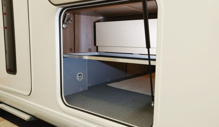 This large storage compartment runs under the lounge right across the ’van, and can be loaded from both sides of the vehicle – it’s heated, too