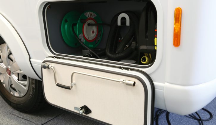 An integrated and accessible service hatch is sited on the nearside rear corner – the winder on the flap is for engaging the rear steadies