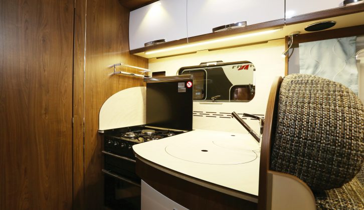 The Frankia F-Line I 640 SD's kitchen is a veritable tour de force, featuring a four-ring cooker above a separate oven and grill, plus a 160-litre fridge