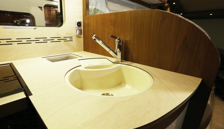 There are two sinks, while perfectly fashioned infills offer a flush expanse of worktop when deployed – read more in the Practical Motorhome Frankia F-Line I 640 SD review