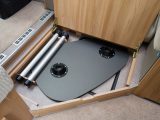 When you don’t need it, the table can be stored away neatly in its own compartment underneath where you’ve been using it – clever!
