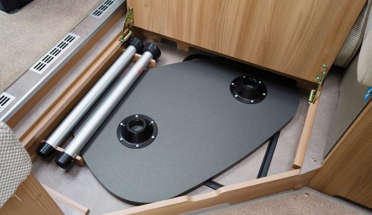 When you don’t need it, the table can be stored away neatly in its own compartment underneath where you’ve been using it – clever!