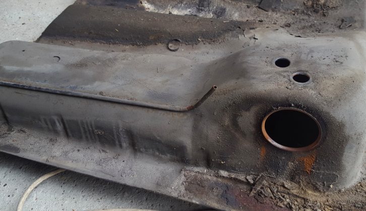 The rusty fuel tank and a faulty fuel gauge were two issues in the camper's fuel system