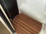 A wooden duckboard is a smart touch, while two drain holes in the shower shows practical thinking from Chausson