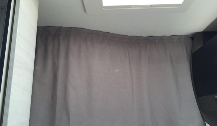 Those sleeping in the front bed can make use of this privacy curtain