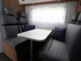 The A 70DK also has a full dinette and rear fixed bunk beds