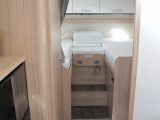 The four-/five-berth Sunlight I 68's layout has fixed single beds at the rear