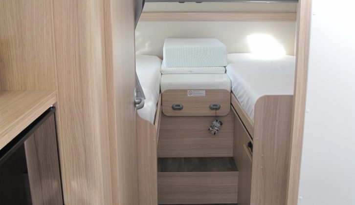 The four-/five-berth Sunlight I 68's layout has fixed single beds at the rear