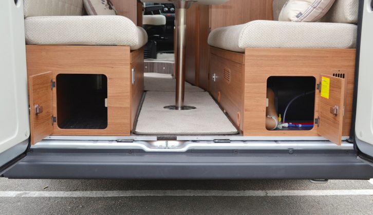 There's clever storage space under the rear sofas in the Tribute 680