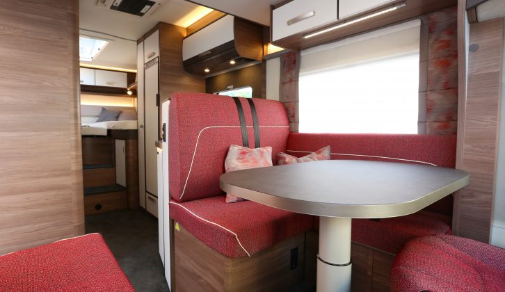 There's a large amount of seating in the Knaus L!VE Wave 700 MEG’s front dinette, seen here with the Matuko soft furnishings scheme