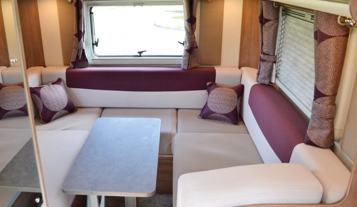 Dining in the rear lounge is a comfortable experience thanks to the spacious freestanding table, which is stowed in the wardrobe