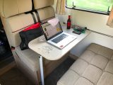 The front dinette was the perfect spot for a mobile office ... until the kids turned up!