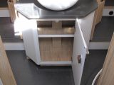 Steps either side of the rear island bed take you into the Pegaso 740's central washroom