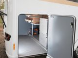 The Frankia F-Line A 740 Plus has a great garage with room for a bike, and the freestanding table and second toilet cassette are stored here, too