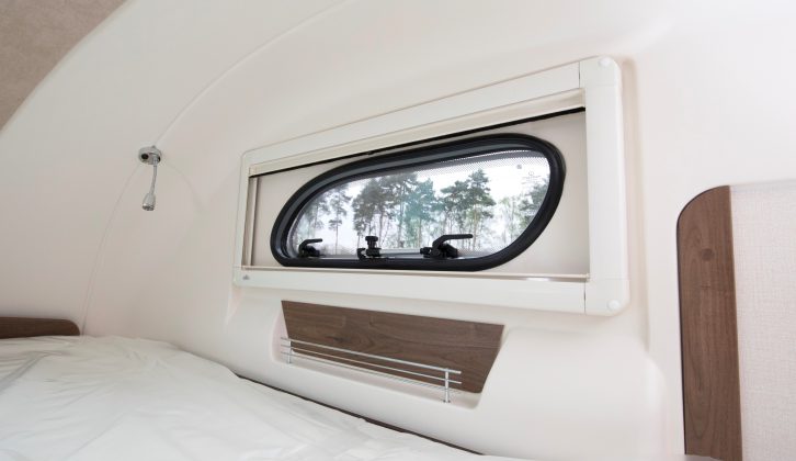 The overcab bed has windows for ventilation and cubbyholes for books, specs and so on – you can keep most things to hand