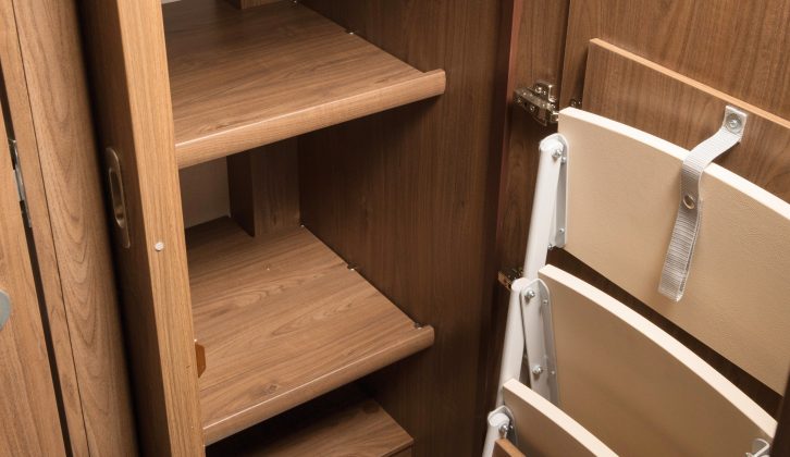 As well as carrying the steps, the shelved cupboard has plenty of storage for folded clothes and other paraphernalia