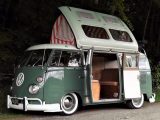 This Agave Green and Silver White Type 2 T1 can sleep four and has a leather and French-polished teak interior