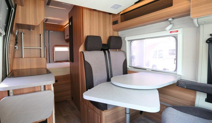 The Weinsberg CaraBus 601 DQ sleeps five, with a longitudinal double over the cab, a make-up single here in the dinette and a transverse double at the rear