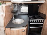 This smart Fenix repairable worktop now features in all Bessacarr motorhomes, seen here in the new 599 and also showcasing a snazzy splashback